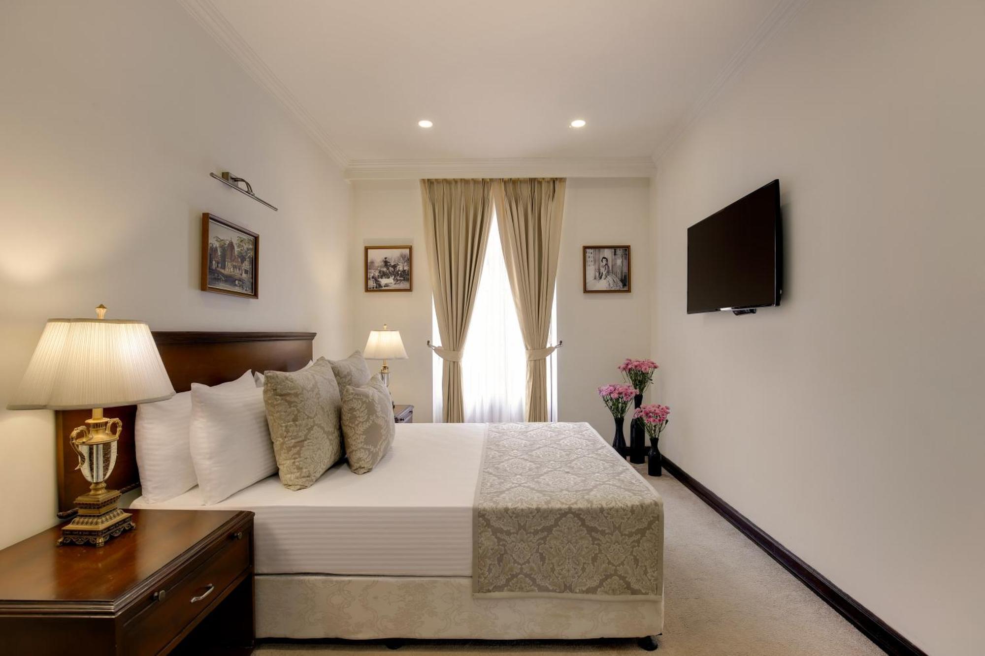 大使-Ihcl精选酒店 新德里 外观 照片 A bedroom at the hotel